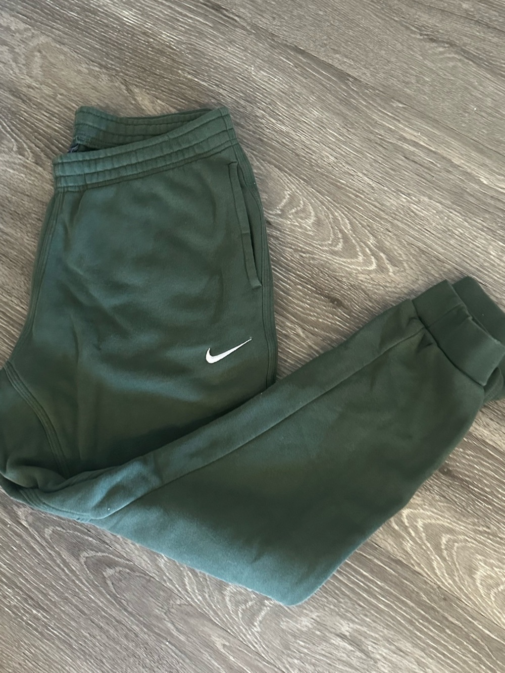 Men's dark green Nike cuffed sweatpants